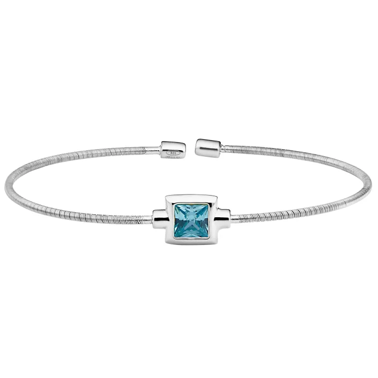 women’s cuff bracelets-Rhodium Finish Sterling Silver Cable Cuff Bracelet with Princess Cut Simulated Aqua Marine Birth Gem