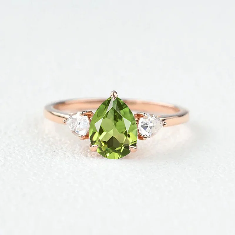 women’s side-stone rings-Pear Shaped Peridot Three Stones Ring